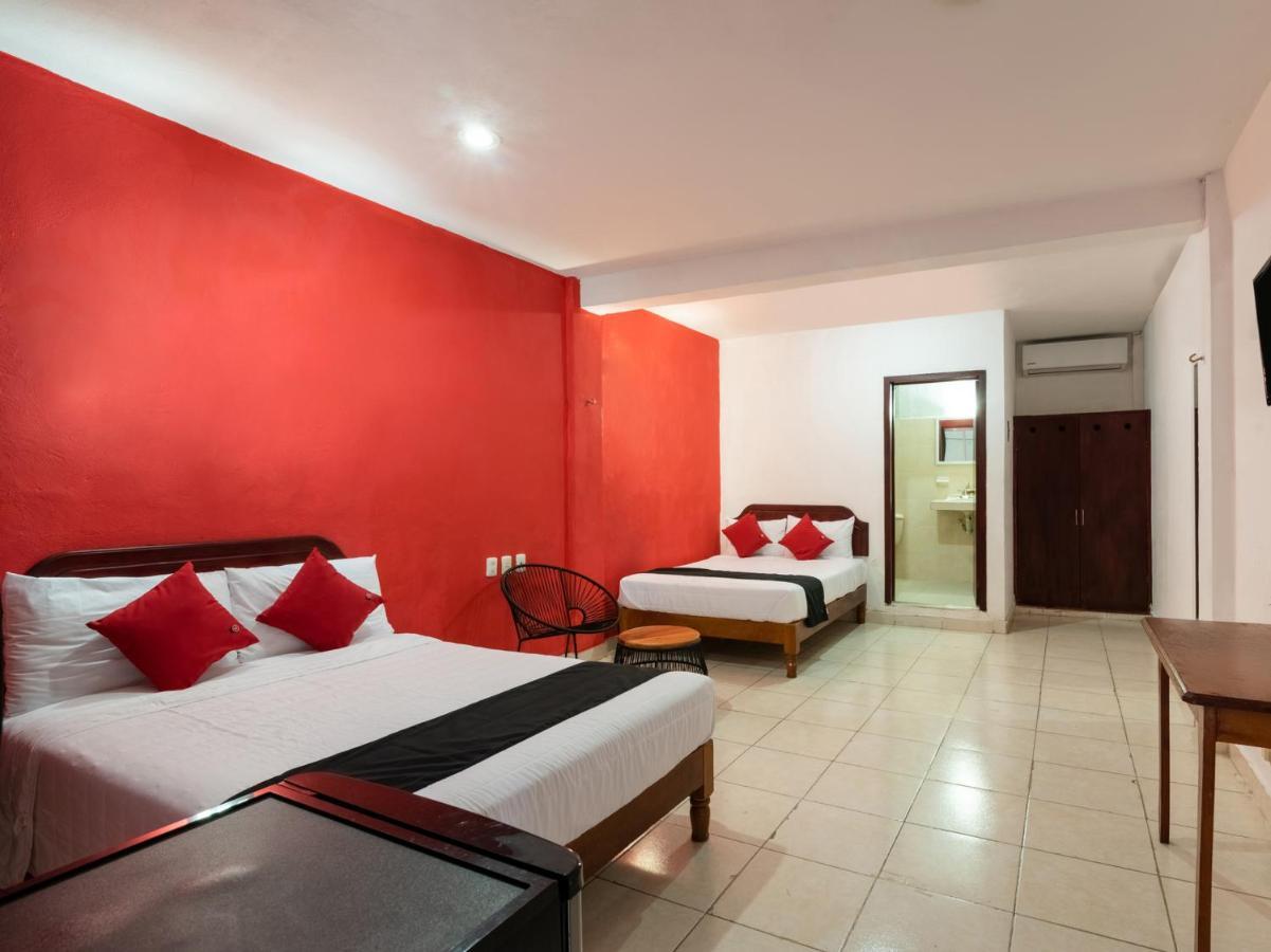 Capital O Hotel El Faisan Y El Venado Playa del Carmen Bagian luar foto