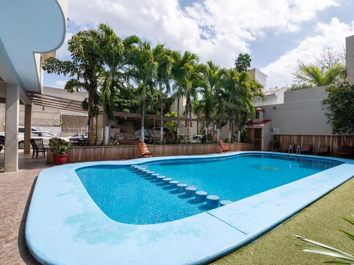 Capital O Hotel El Faisan Y El Venado Playa del Carmen Bagian luar foto