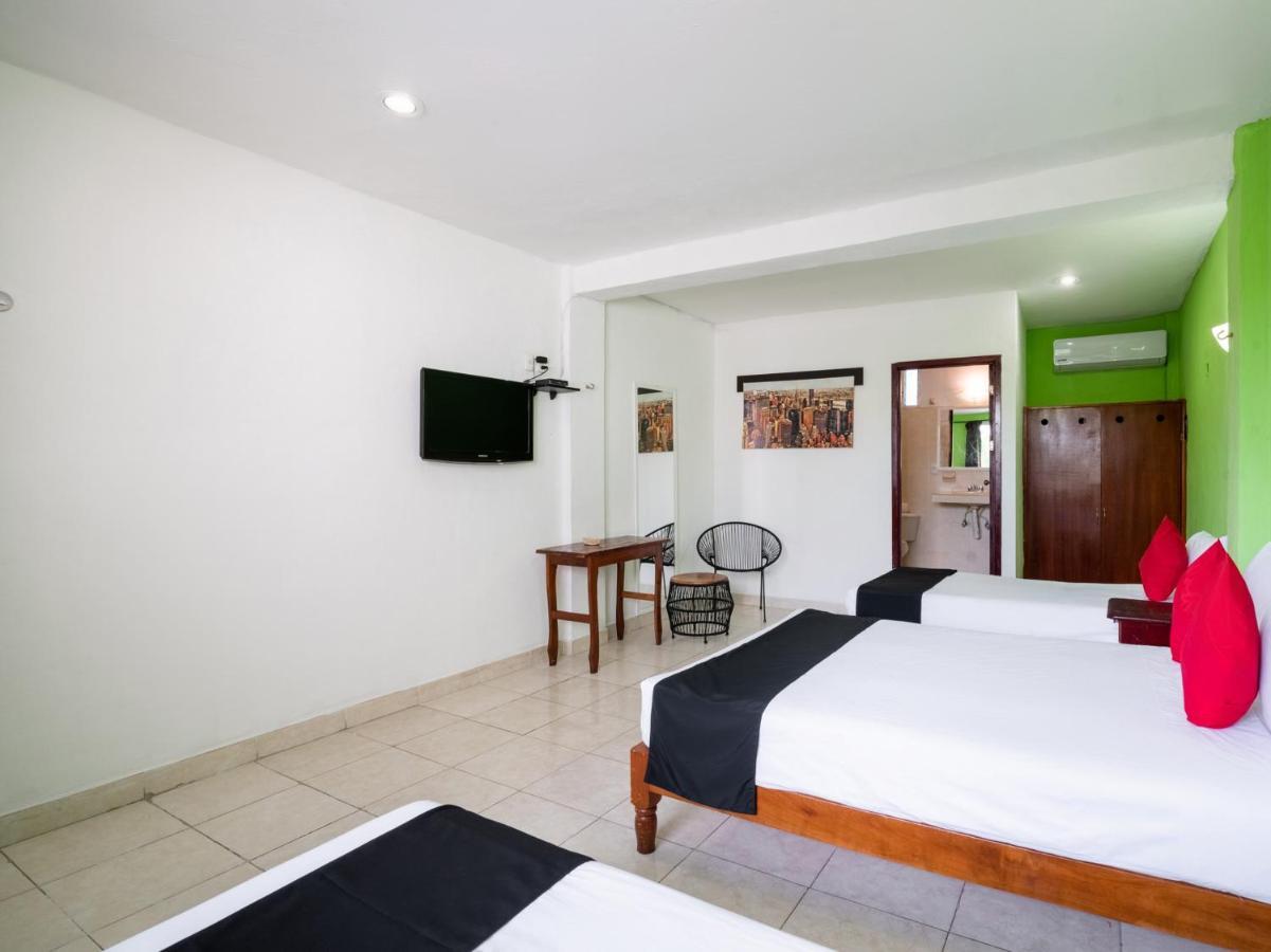Capital O Hotel El Faisan Y El Venado Playa del Carmen Bagian luar foto